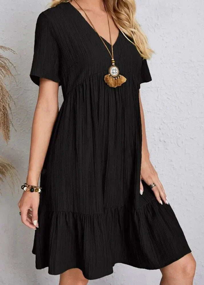Enora - An elegant dress that enhances the bump