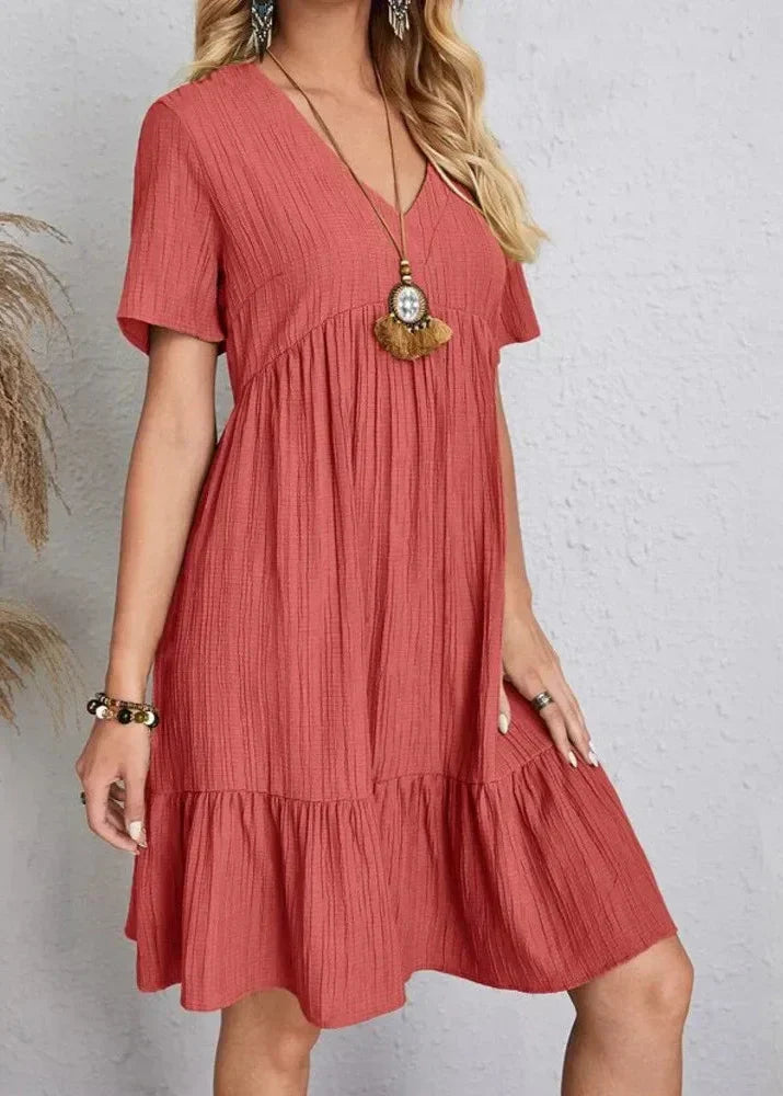 Enora - An elegant dress that enhances the bump