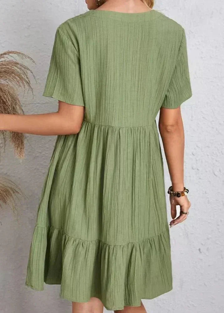 Enora - An elegant dress that enhances the bump