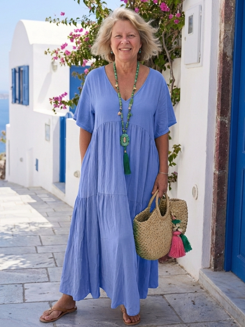 Ivone | Maxi vestido em azul com mangas curtas e folhos